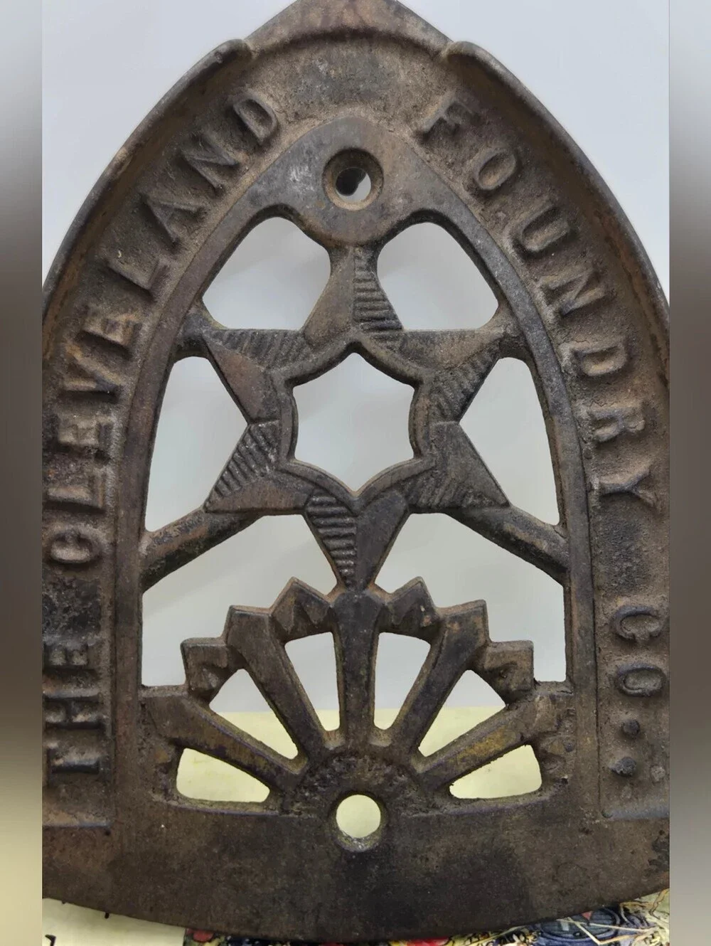 Antique Cast Iron Trivet Manufactured by The Cleveland Foundry Co. in Ohio.